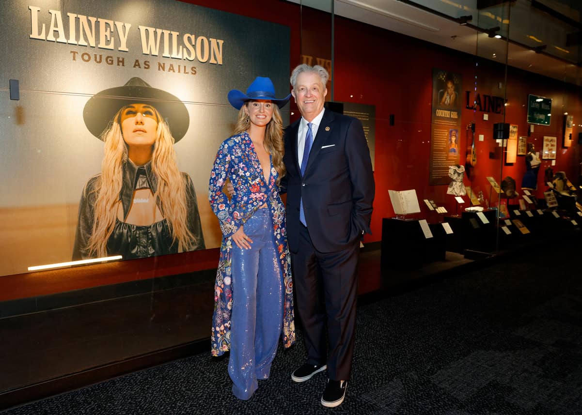Lainey Wilson and Country Music Hall of Fame and Museum CEO, Kyle Young; Photo by Jason Kempin/Getty Images for the Country Music Hall of Fame and Museum