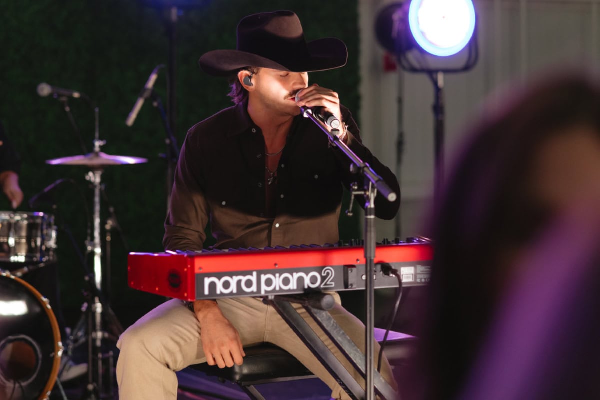 Tucker Wetmore Performing at 2025 Hangar Party; Photo Courtesy of William King